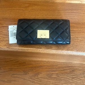Black Michael Kors Carryall Leather quilted wallet